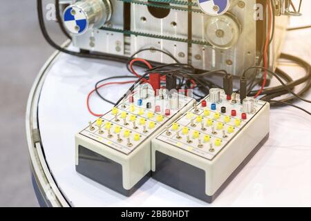 Automatic electrical connector switch in power lines of inverter controller drive located inside of an industrial switch control panel board. Stock Photo