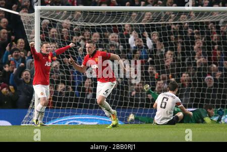 Manchester United's Phil Jones (centre) celebrates scoring their first goal of the game Stock Photo