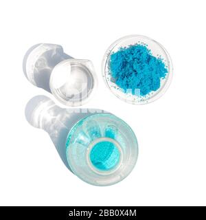 Close up inorganic chemical on white laboratory table. Copper(II) sulfate,  alcohol. Chemical ingredient for Cosmetics & Toiletries product. Top View. Stock Photo