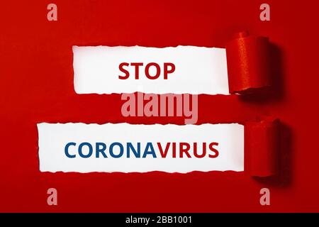 Words on red craft paper. Stop coronavirus layout. Outbreak of coronavirus concept. Novel virus - COVID-19-nCoV. Stock Photo