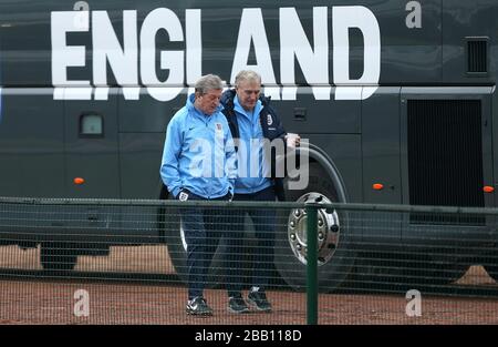 England manager Roy Hodgson (left) and Trevor Brooking Stock Photo