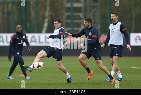 England's James Milner in action during training Stock Photo