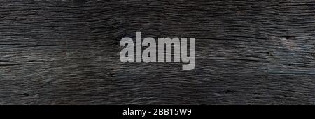 Horizontal texture in very old black wood Stock Photo