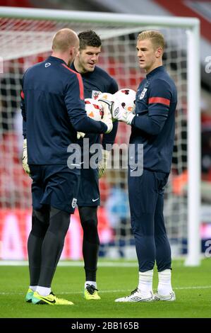 England goalkeeper John Ruddy, Fraser Forster and Joe Hart (left to right) during the warm-up Stock Photo