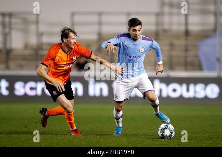 Manchester City's Nabil Touaizi Zoubdi and Shakhtar Donetsk's Nazarii Muravskyi battle for the ball Stock Photo