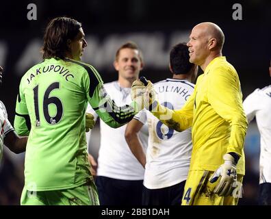 Hull City's goalkeeper Eldin Jakupovic and Tottenham Hotspur's goalkeeper Brad Friedel shake hands after the game Stock Photo