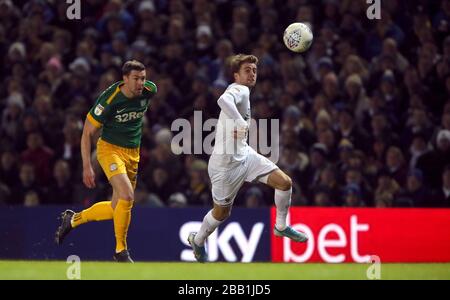 Preston North End's Paul Huntington (left) and Leeds United's Patrick Bamford Stock Photo