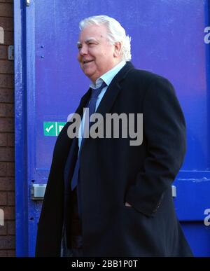 Chairman of Everton football club Bill Kenwright arrives ahead of the match Stock Photo