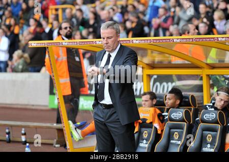 Wolverhampton Wanderers manager Kenny Jackett checks his watch on the touchline Stock Photo