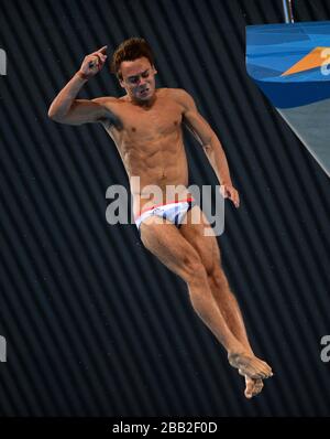 Great Britain's Tom Daley in action during the Men's 10m Platform Semi Final Round at the Aquatic Centre Stock Photo