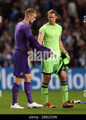 Manchester City's goalkeeper Joe Hart (left) and Bayern Munich's goalkeeper Manuel Neuer Stock Photo