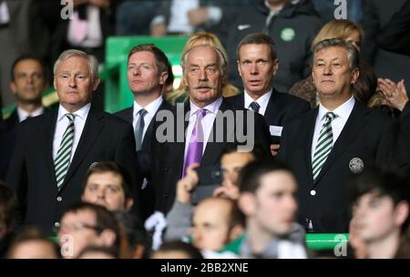 Celtic owner Dermot Desmond (centre) in the stands next to Celtic chief executive Peter Lawell (r) Stock Photo