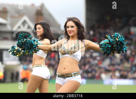 Jacksonville Jaguars cheerleaders perform on the pitch at half-time Stock Photo