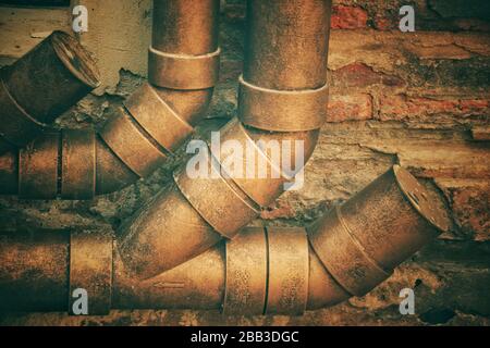 Rustic metal pipes showing a steam punk themed background Stock Photo