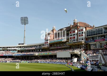 The crowds enjoy the action from The Pavilion at the Kia Oval Stock Photo