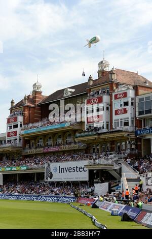 The crowds enjoy the action from The Pavilion at the Kia Oval Stock Photo