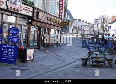 A normally busy Whitley Bay sea front shops and amusements, bars and restaurants almost empty due to the Coronavirus. Stock Photo