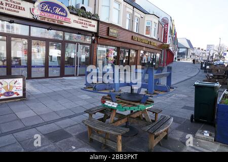 A normally busy Whitley Bay sea front shops and amusements, bars and restaurants almost empty due to the Coronavirus. Stock Photo