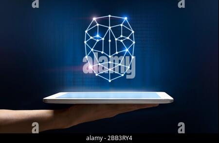 Personal security. Woman holding tablet with polygonal human face on dark background, creative collage Stock Photo