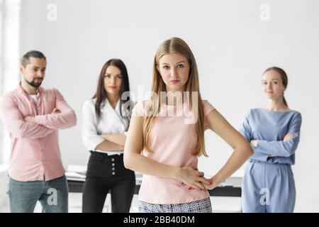 Young successful woman. Team leader. The concept of entrepreneurs, business, teamwork and work on success. Stock Photo