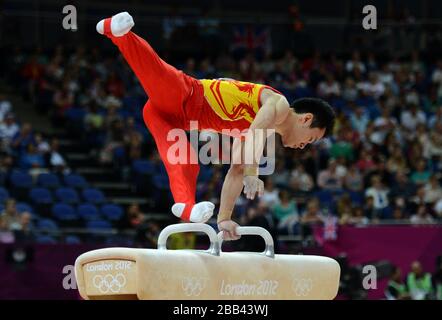 China's Weiyang Guo competes on the pommel horse during the Artistic Gymnastics team qualification at the North Greenwich Arena, London. Stock Photo