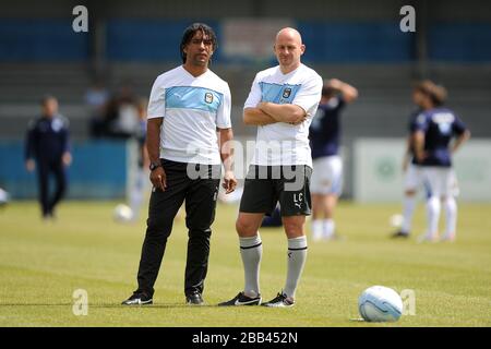 Coventry City coaches Richard Shaw and Lee Carsley (right) during the warm-up Stock Photo