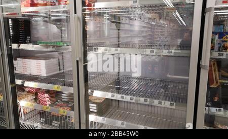 Gyor Hungary 03 17 2020: Empty shelves in an interspar because of the coronavirus. Stock Photo