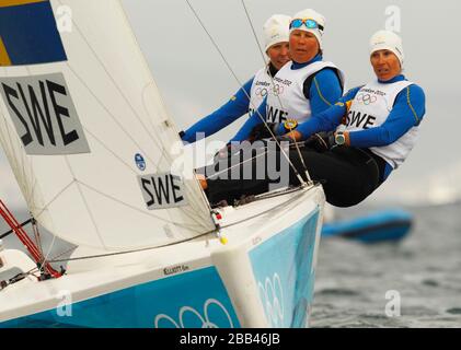Sweden's Women's Match Racing team of Anna Kjellberg, Malin Kallstrom and Lotta Harrysson on Weymouth Bay today during the Olympic Games. Stock Photo