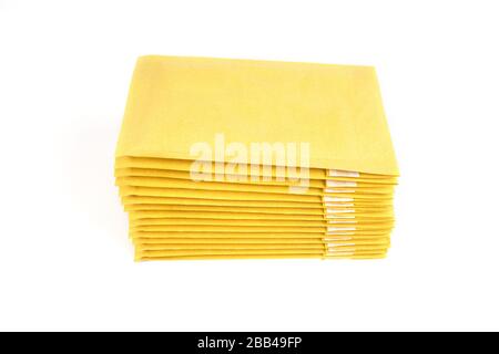 A stack of padded envelopes isolated on white. Top side view Stock Photo