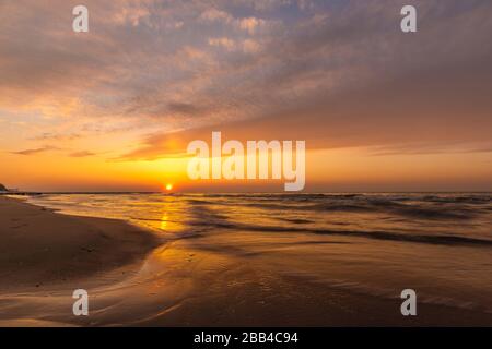 Beautiful, colorful sunset over Baltic sea Stock Photo
