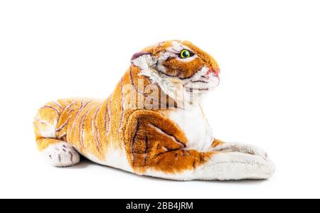 Tiger toy sitting on the white Stock Photo