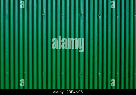 green painted corrugated iron wall background Stock Photo