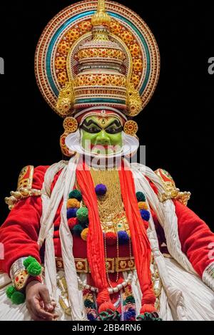 Traditional Kathakali Hindu performer isolated on black background, performance art in Kerala Stock Photo