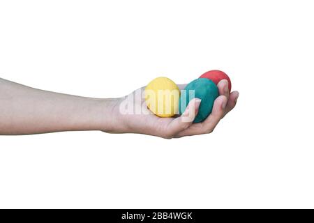 colorful easter eggs in hand isolated on a white background. with clipping path. Stock Photo