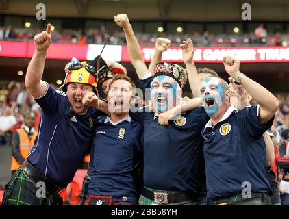 Scotland fans show support for their team in the stands Stock Photo