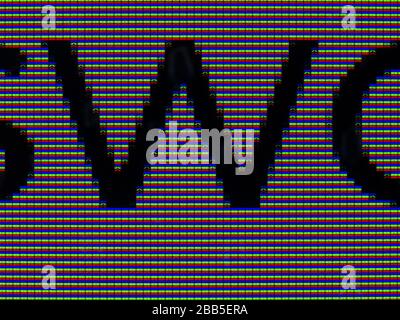 Black W letter between colorful led display pixels Stock Photo