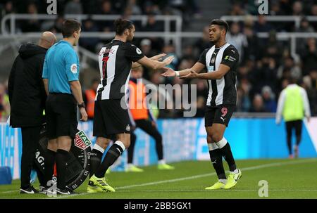 Newcastle United's Andy Carroll (left) replaces team-mate Joelinton Stock Photo