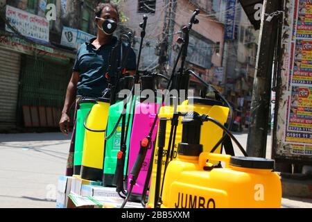 Dhaka, Bangladesh. 30th Mar, 2020. A vendor sales disinfectant sprayers on the streets amid concerns about the spread of Coronavirus pandemic.Bangladesh has confirmed 49 cases, with 5 deaths due to corona virus (COVID-19), According to the IEDCR officials. Credit: SOPA Images Limited/Alamy Live News Stock Photo