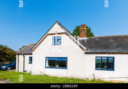 Front view of the National school building 1834, Bosham, a coastal village on the south coast near Chichester, West Sussex, southern England, UK Stock Photo
