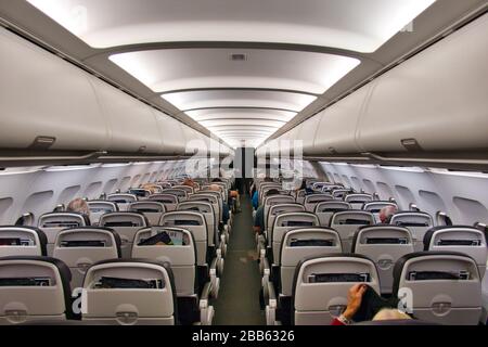 The cabin of a British Airways airplane travelling from Madeira (FNC) to Gatwick (LGW) - the plane is G-GATH, an Airbus A320-232, built in 2021 Stock Photo