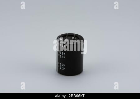 Electrolytic capacitor isolated on white background. Stock Photo