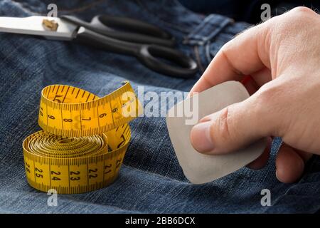 Cloth measuring tape for clothes making Stock Photo - Alamy
