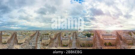 Panoramic urban skyline of Haussmanian buildings and Eiffel Tower in the city of Paris, France Stock Photo