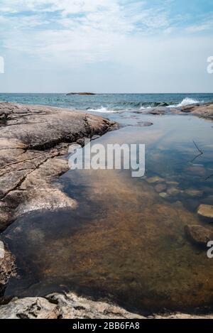 Rocky promontory in Superior Lake Park. Canada Stock Photo