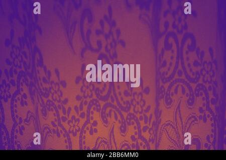 Fascinating purple and orange ornamets created by sun from the window. Abstract gradient beautiful background with geometric shape shadows of bright Stock Photo