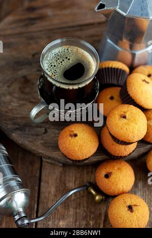 Muffins - delicious pastries. Delicious dessert on the table - homemade muffins. Portioned cupcakes. Simple muffin. Stock Photo