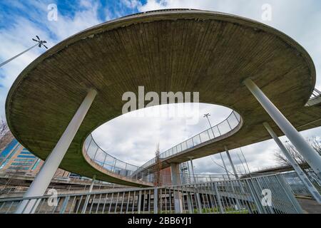 View of circular urban footbridge  crossing the M8 motorway in Glasgow, Scotland, UK Stock Photo