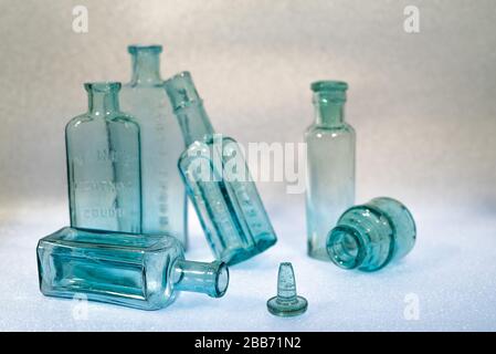 Vintage blue glass bottles of various shapes and sizes - still life Stock Photo