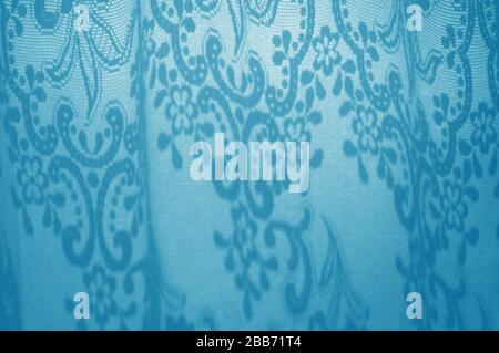 Amazing light blue ornamets created by sun from the window. Abstract gradient beautiful background with geometric shape shadows of bright sunlight Stock Photo