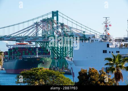 2020:March 27 SAN PEDRO, CALIFORNIA USA: U.S Navy’s hospital ship USNS Mercy arriving at the Port of Los Angeles, navy nurse now has the Coronavirus Stock Photo